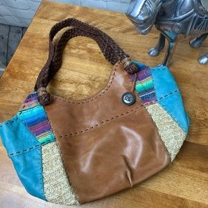 The Sak Leather and Straw Hobo Bag